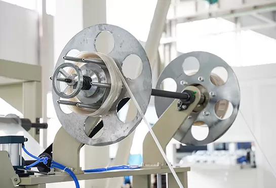 Enroulement du mat&eacute;riau de bord : enroulement du mat&eacute;riau de bord coup&eacute; en faisceaux.